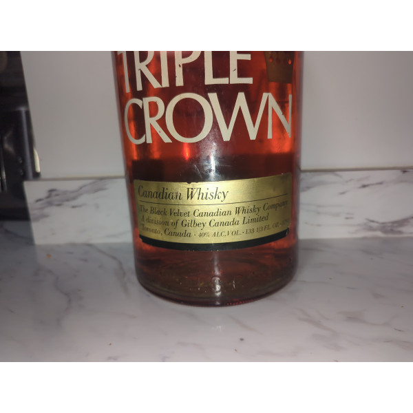 Triple Crown black velvet  Triple Crown Canadian Whisky 750ml (Gilbey Canada).5